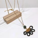 Collier en soie noire et rubis zoïsite