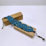 Dentelle de soie bleue turquoise et hématite
