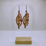 B.O. oeil-de-tigre et dentelle de soie ocre